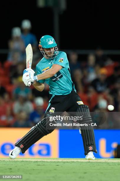 Chris Lynn of the Heat plays a shot during the Men's Big Bash League match between the Brisbane Heat and the Melbourne Renegades at Metricon Stadium,...