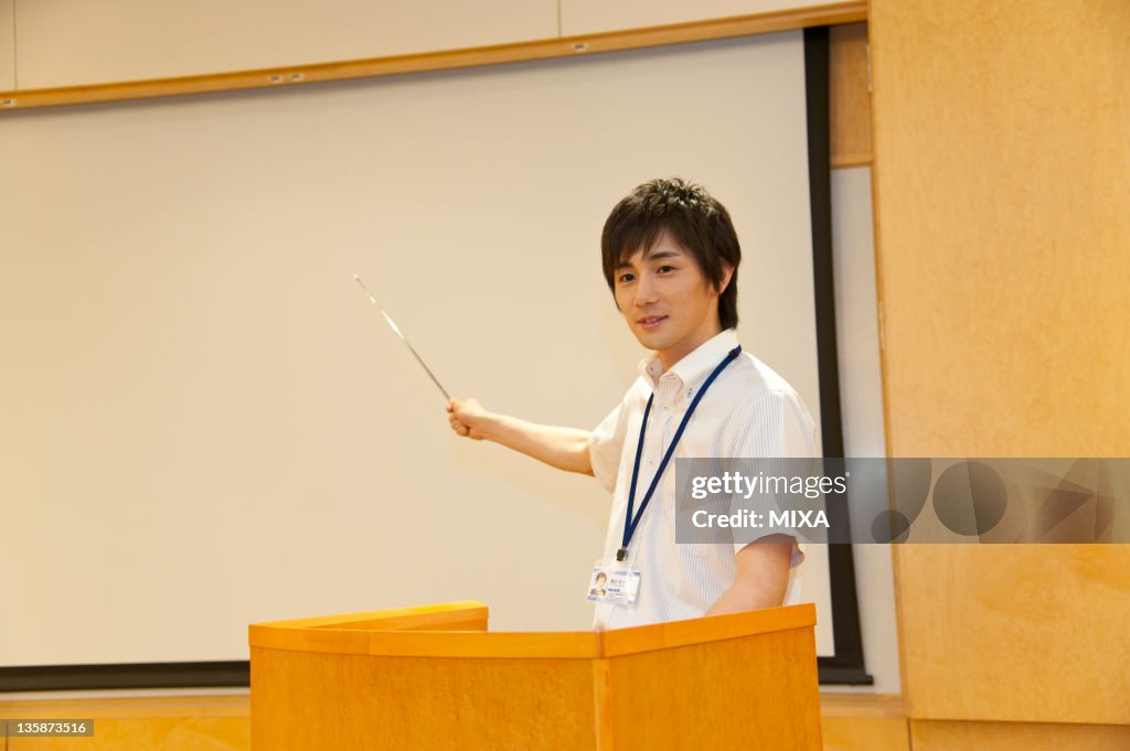 Businessman in business casual making a presentation