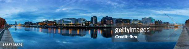 dublin skyline panorama and liffey river (ireland) - dublin cityscape stock pictures, royalty-free photos & images