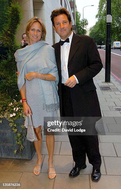 Mark Nicholas and guest during Tom Moody Testimonial - Arrivals at The Dorchester Hotel in London, Great Britain.