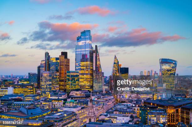 city of london business district at sunset, london, uk - london imagens e fotografias de stock