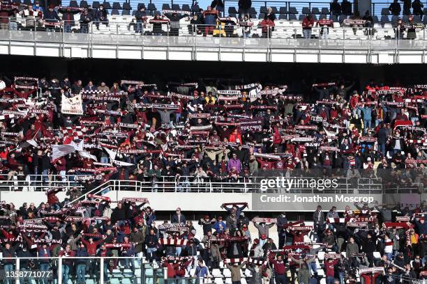 Torino FC fans hold up scarves as the club's anthem is played prior to kick off in the Serie A match between Torino FC and Bologna FC at Stadio...