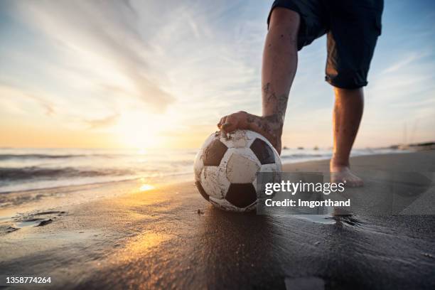 teenage boys playing soccer on on beach - barefeet soccer stock pictures, royalty-free photos & images