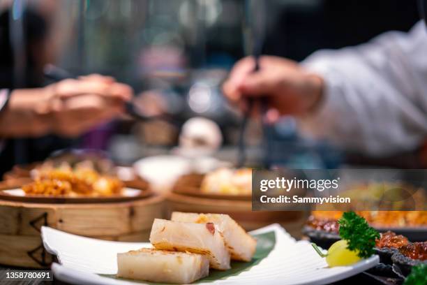 close-up of variation of dim sum in a restaurant - 中華料理 ストックフォトと画像