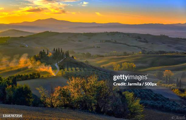 wake me up before you go-go,scenic view of landscape against sky during sunset,monte amiata,toscana,italy - italian cypress bildbanksfoton och bilder