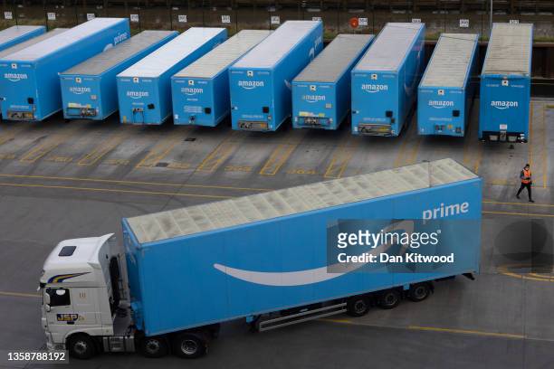 Amazon Prime lorries are seen at the Amazon fulfilment centre on December 13, 2021 in London, England. In September, the e-commerce giant announced...