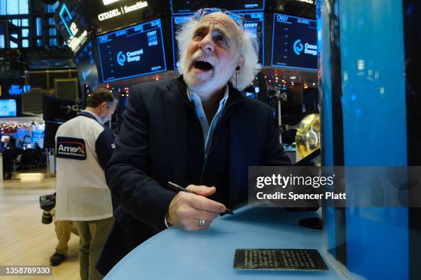 Stock trader Peter Tuchman works on the floor of the New York Stock Exchange on December 13, 2021 in New York City. As investors are still concerned...