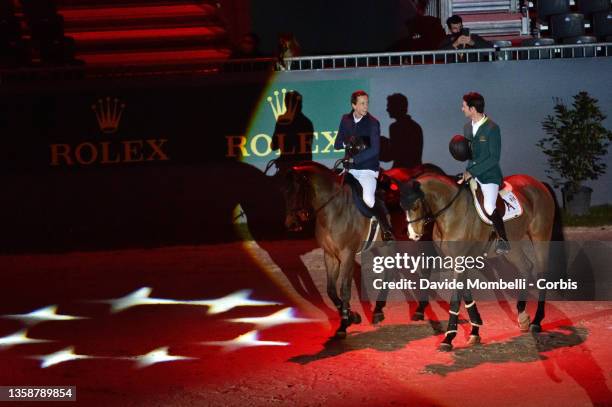 Martin Fuchs and Steve Guerdat from Switzerland during GP Rolex CHI Geneva on December 11, 2021 in Geneva, Switzerland.