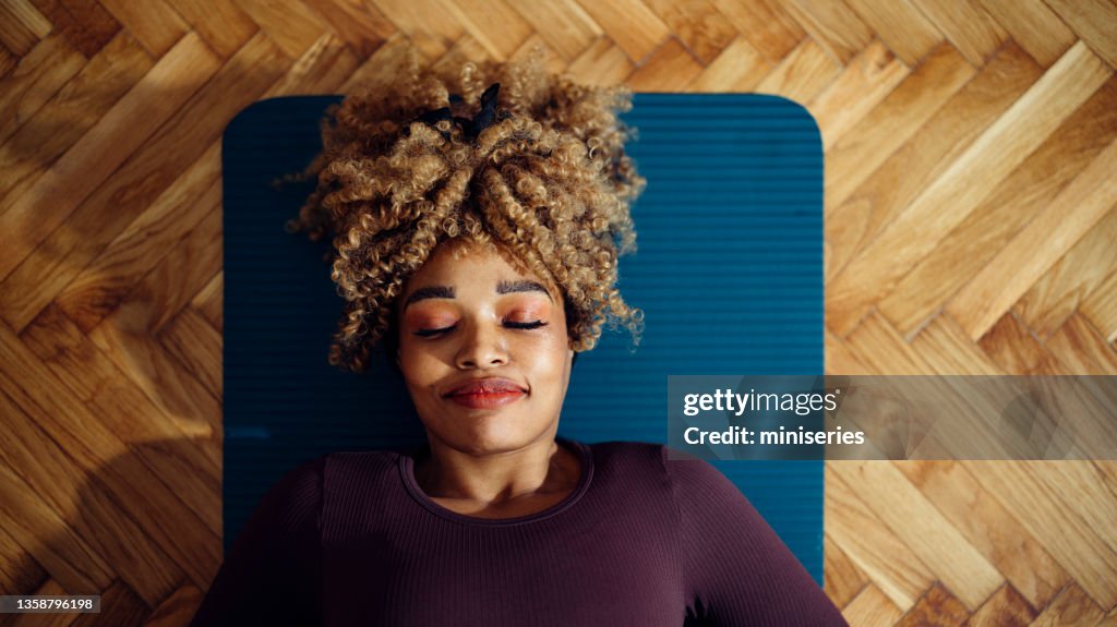 Relaxation: Beautiful Afro-American Woman Doing Yoga