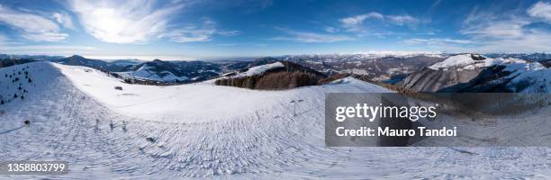 hiker walking on the mountain ridge, orobie, pre alps, bergamo, italy. - mauro tandoi foto e immagini stock