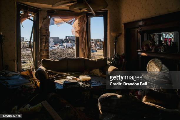 Home is badly damaged following a tornado three days prior, on December 13, 2021 in Mayfield, Kentucky. Multiple tornadoes struck several Midwest...