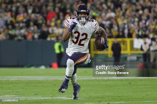 David Montgomery of the Chicago Bears runs for yards during a game against the Green Bay Packers at Lambeau Field on December 12, 2021 in Green Bay,...