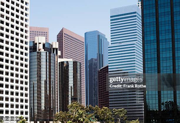 city skyline full of modern office buildings - office skyscraper stock pictures, royalty-free photos & images
