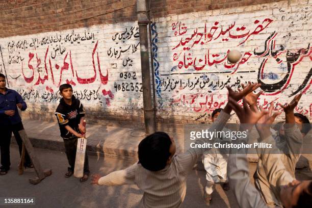Kids playing Cricket on the streets of Lahore, Pakistan.