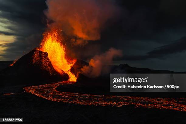 scenic view of lava against sky,fagradalsfjall,iceland - volcano erupting imagens e fotografias de stock
