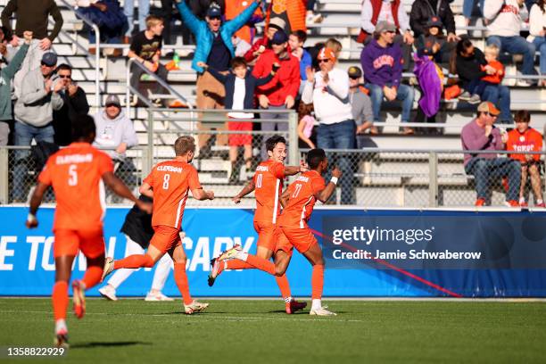 The Clemson Tigers celebrate the second goal by Isaiah Reid against the Washington Huskies during the Division I Men's Soccer Championship held at...