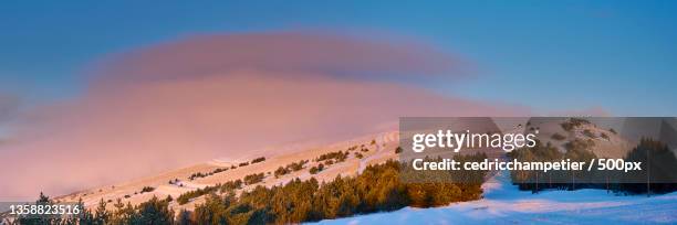ventoux sunrise panorama,panoramic view of snowcapped mountains against sky,mont ventoux,brantes,france - mont ventoux imagens e fotografias de stock