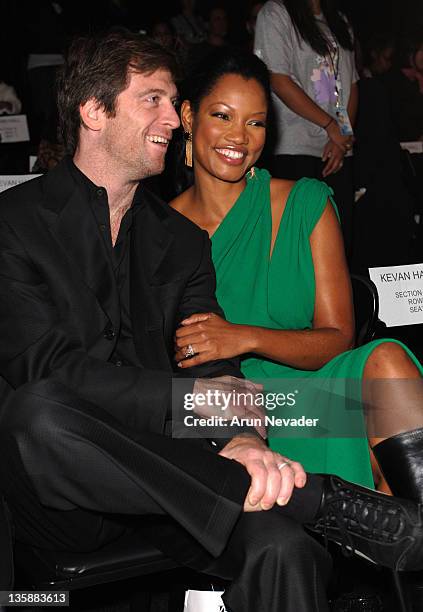 Garcelle Beauvais and guest during Mercedes-Benz Spring 2006 L.A. Fashion Week at Smashbox Studios - Kevan Hall - Front Row at Smashbox Studios in...