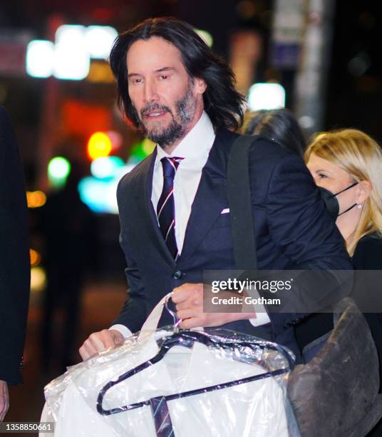 Keanu Reeves arrives at Ed Sullivan theater for Stephen Colbert show on December 13, 2021 in New York City.