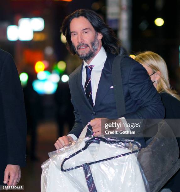 Keanu Reeves arrives at Ed Sullivan theater for Stephen Colbert show on December 13, 2021 in New York City.