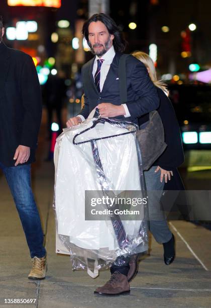 Keanu Reeves arrives at Ed Sullivan theater for Stephen Colbert show on December 13, 2021 in New York City.