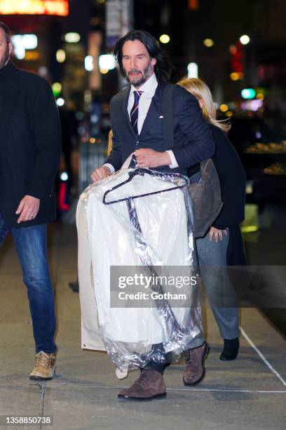 Keanu Reeves arrives at Ed Sullivan theater for Stephen Colbert show on December 13, 2021 in New York City.