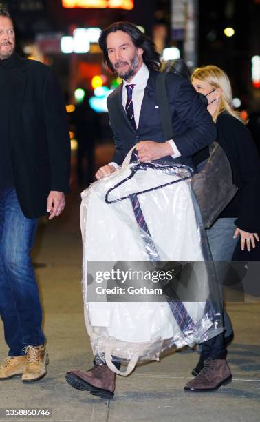 Keanu Reeves arrives at Ed Sullivan theater for Stephen Colbert show on December 13, 2021 in New York City.