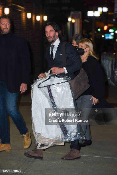 Keanu Reeves arrives at the Late Show with Stephen Colbert in Manhattan on December 13, 2021 in New York City.