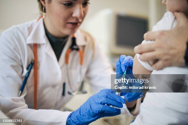 pediatrician's office - epidemiology stock pictures, royalty-free photos & images