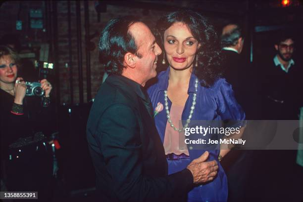 Celebrity photographer Francesco Scavullo and fashion designer Diane von Furstenberg chat at the popular nightclub Studio 54 circa 1978 in New York...