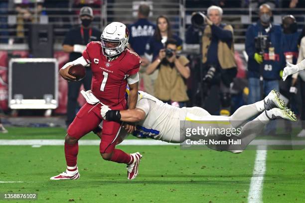 Kyler Murray of the Arizona Cardinals is tackled by Greg Gaines of the Los Angeles Rams in the second quarter of the game at State Farm Stadium on...