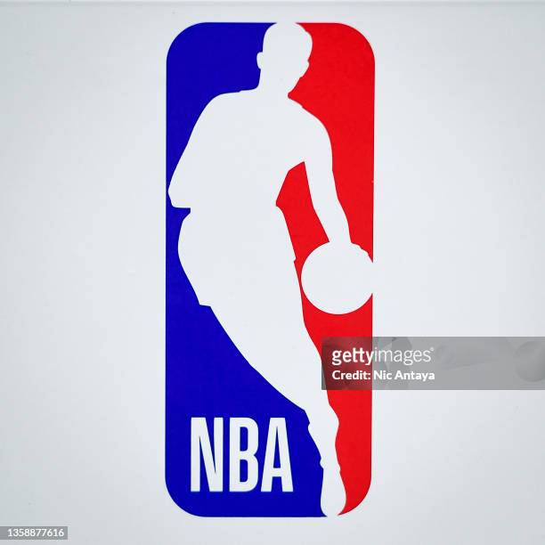 The NBA logo is pictured before the game between the Detroit Pistons and Brooklyn Nets at Little Caesars Arena on December 12, 2021 in Detroit,...