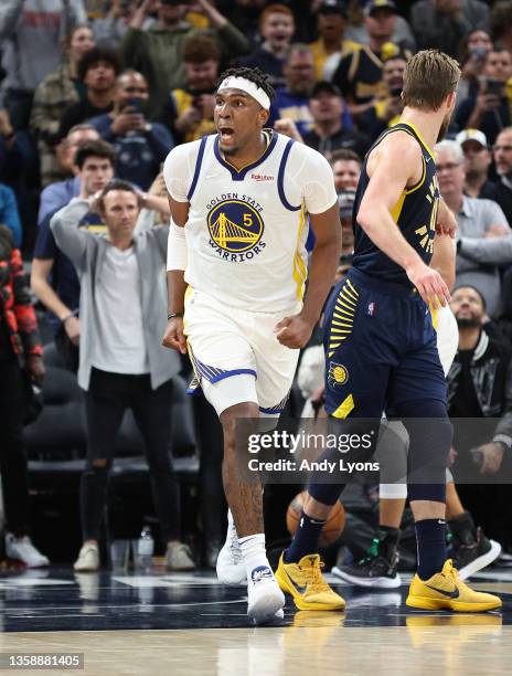 Kevon Looney of the Golden State Warriors celebrates after making the game winning basket against the Indiana Pacers at Gainbridge Fieldhouse on...