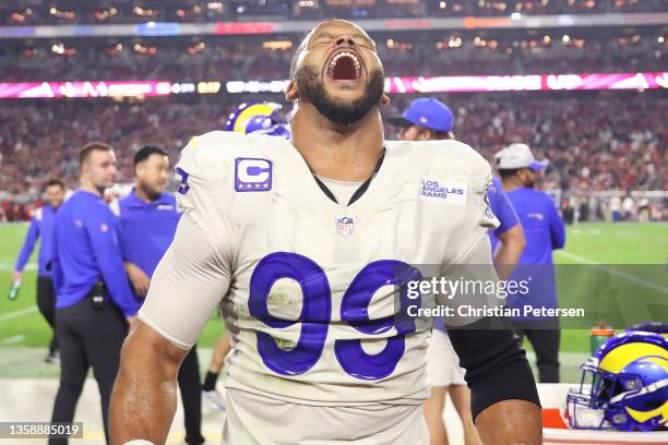 Aaron Donald of the Los Angeles Rams reacts during the fourth quarter against the Arizona Cardinals at State Farm Stadium on December 13, 2021 in...