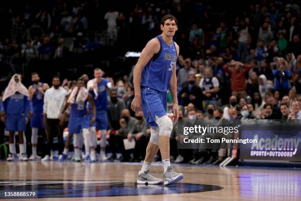 Boban Marjanovic of the Dallas Mavericks reacts against the Charlotte Hornets in the fourth quarter at American Airlines Center on December 13, 2021...