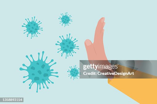 Stop Coronavirus. Vista laterale della mano umana che gesticola ferma le cellule del coronavirus. Stop Coronavirus. Vista laterale della mano umana che gesticola ferma le cellule del coronavirus.