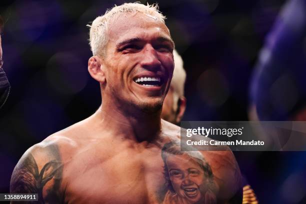 Charles Oliveira of Brazil looks on in his lightweight title fight against Dustin Poirier during the UFC 269 event at T-Mobile Arena on December 11,...