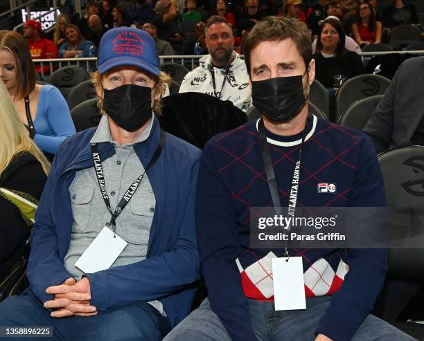 Owen Wilson and Luke Wilson attend Houston Rockets v Atlanta Hawks game at State Farm Arena on December 13, 2021 in Atlanta, Georgia.