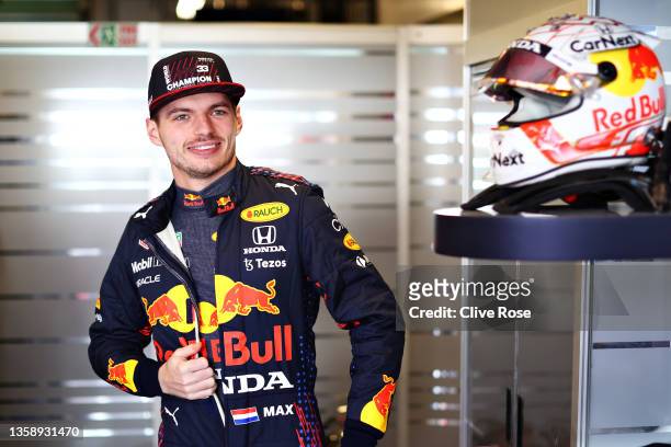 Max Verstappen of Netherlands and Red Bull Racing prepares to drive in the garage during Formula 1 testing at Yas Marina Circuit on December 14, 2021...