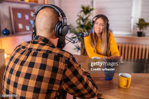 podcast host and guest recording interview - radio host stock pictures, royalty-free photos & images