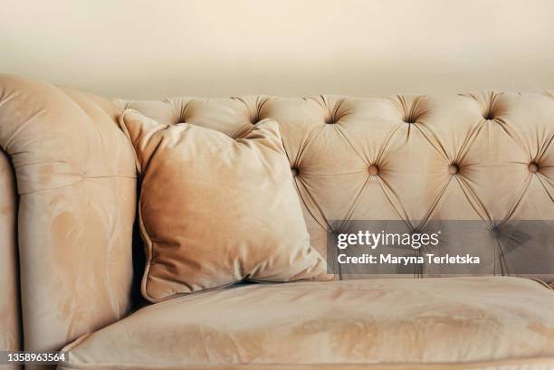beautiful beige textured velor sofa. - distressed suede stock pictures, royalty-free photos & images