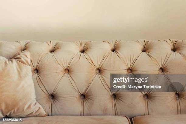 beautiful beige textured velor sofa. - distressed suede stock pictures, royalty-free photos & images