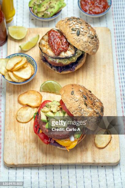vegan burgers made of grains and beans - burger overhead stock-fotos und bilder