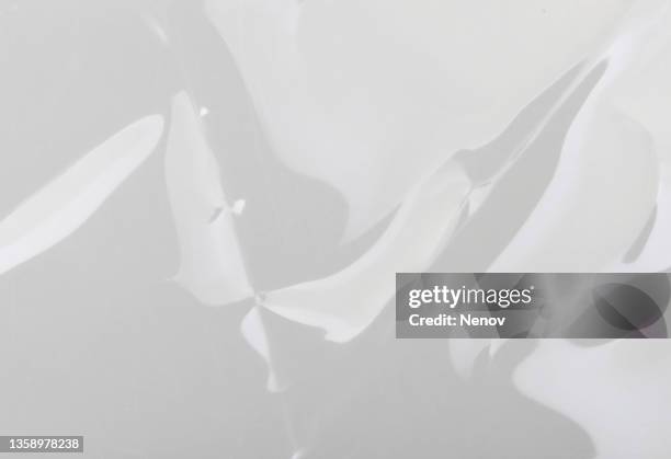 image of hard plastic packaging - scrunched plastic bag stock pictures, royalty-free photos & images