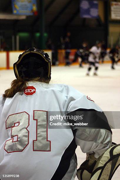 women_goalie - female hockey player stock pictures, royalty-free photos & images