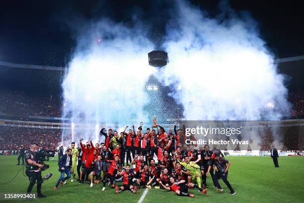 Players of Atlas pose with the trophy after winning the final second leg match between Atlas and Leon as part of the Torneo Grita Mexico A21 Liga MX...