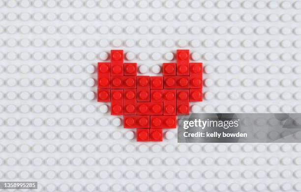 love heart shape bricks valentines day health care - pflegeheim symbol stock-fotos und bilder