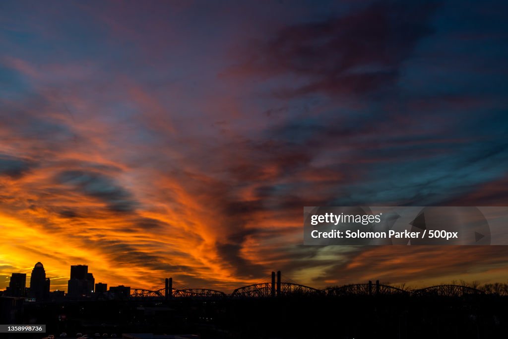 Silhouette of buildings against dramatic sky during sunset,Louisville,Kentucky,United States,USA