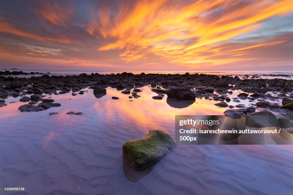 Green algae rocks,Scenic view of sea against sky during sunset,Ko Chang,Thailand