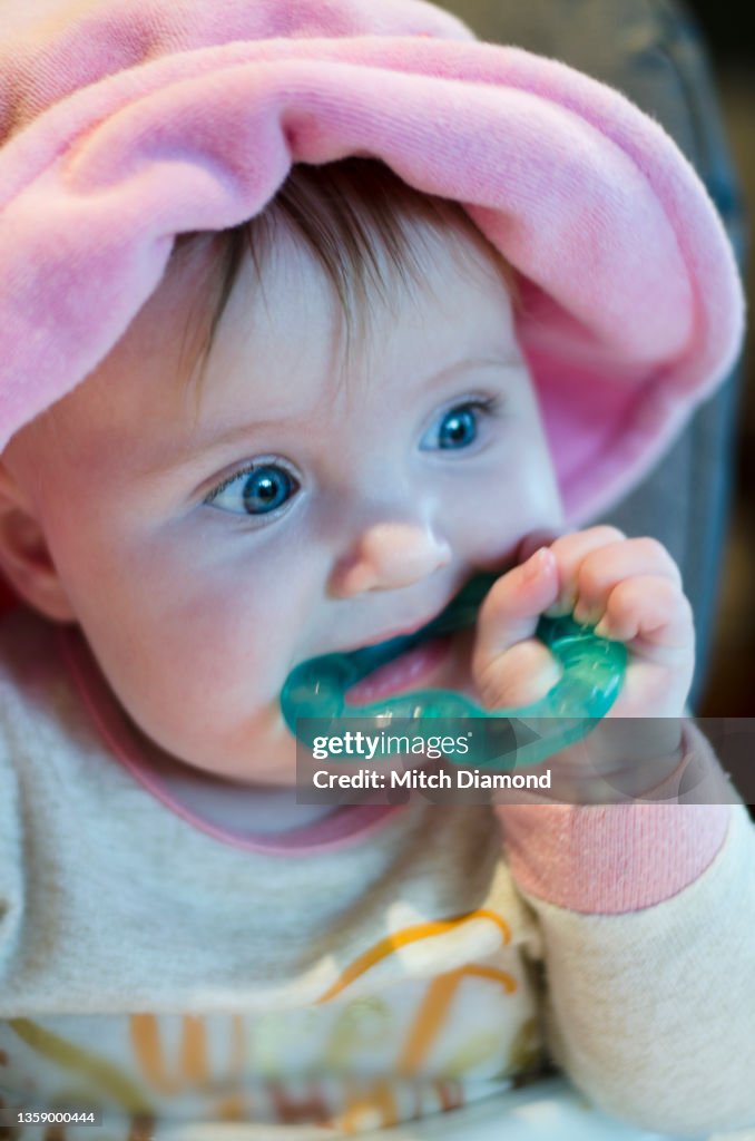 Baby with Teething Toy
